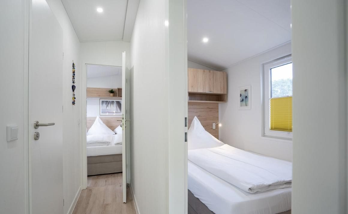 Zweites Schlafzimmer mit zwei Einzelbetten